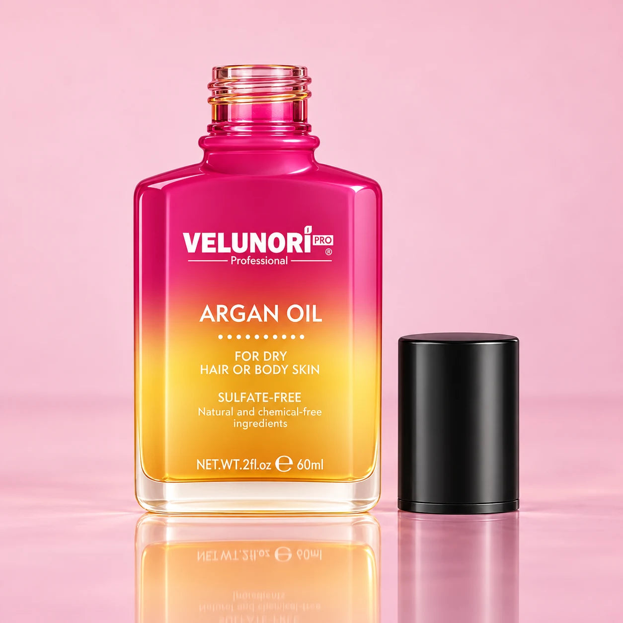 Argan Hair Oil in the original VELUNORI pink and turquoise packaging